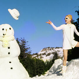 Krister McMenamy with Snowman by Arthur Elgort