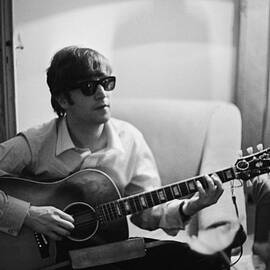 Lennon In Paris by Harry Benson