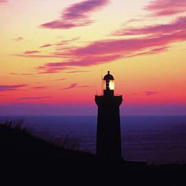Lighthouse And Dawn by Lucgillet