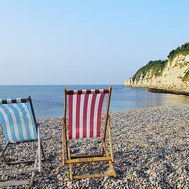 Lounge Chairs On Beach by Arcangelo Piai