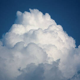 Low Angle View Of Cumulonimbus Clouds by Medioimages photodisc