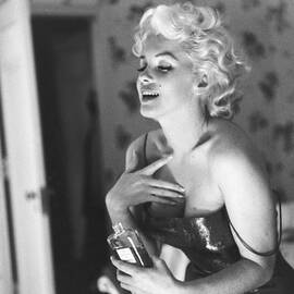 Marilyn Monroe With Chanel No. 5 by Michael Ochs Archives
