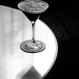 Martini Glass On Table by Heeb Photos