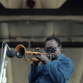 Miles Davis Performs At Newport by David Redfern