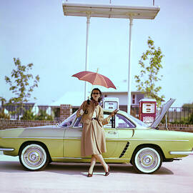 Model in Front of a Gold Renault Caravelle by Jerry Schatzberg