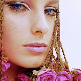 Model with Roses on Her Braids by Gene Laurents