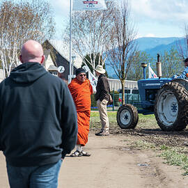 Monk and Tractor by Tom Cochran