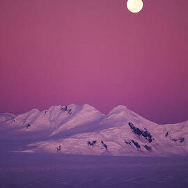 Moonrise Over Snowy Mountain by Ascent pks Media Inc.
