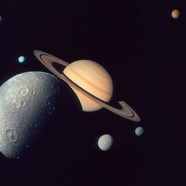 Moons Of Saturn by Space Frontiers