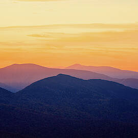 Mountain Light And Silhouette  by Jeff Sinon
