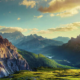 Mountains And Valley At Sunset by Mammuth