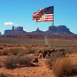 Navajo - American flag in Monument Valley, Utah by Miroslav Liska