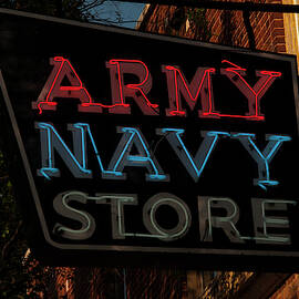 neon army navy store sign by Flees Photos