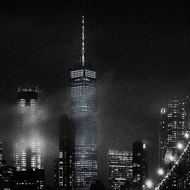 Night Cityscape From The Brooklyn Bridge by Carlos Ramirez