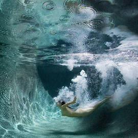 Nude Female Diving Underwater by Ed Freeman