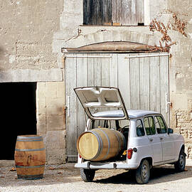 Old Renault In Front Of Vineyard Laden With Wine Barrel In Trunk by Jalag / Joerg Lehmann