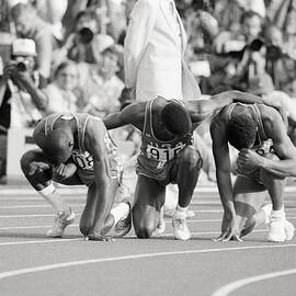 Olympic Medal Winners Pray In Thanks by Bettmann