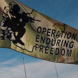 Operation Enduring Freedom flag blowing in the breeze by Flees Photos