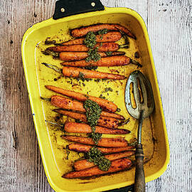 Oven Roasted Baby Carrots With Herb Harissa by Hein Van Tonder