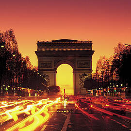 Paris, France, Arc De Triomphe At Night by Peter Adams