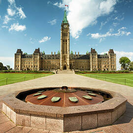Parliament Hill In Ottawa by Pgiam