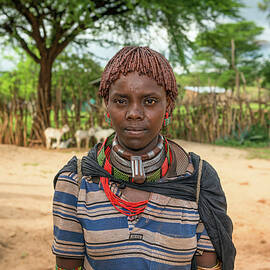 Portrait of a hamar woman in south Ethiopia by Miroslav Liska