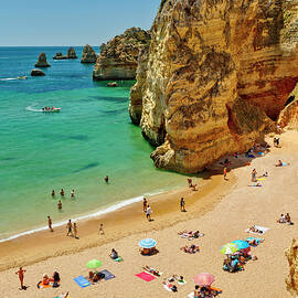 Portugal, Faro, Lagos, Algarve, Praia De Dona Ana, A Detail Of Dona Ana Beach Near Lagos With The Red Sandstone Cliffs by Michael Howard