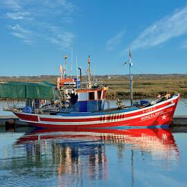 Portugal, Faro, Tavira, Portugal, The Eastern Algarve, Santa Luzia Fishing Boat In The Lagoon by Michael Howard