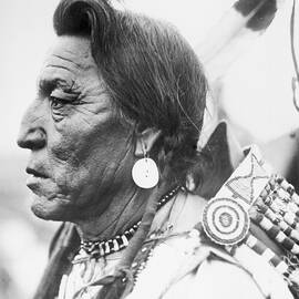Profile Portrait Of Chief Two Guns by Bettmann