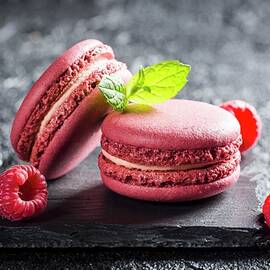 Raspberry Macaroons On A Black Stone by Shaiith