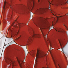 Red Lollipops by Romulo Yanes