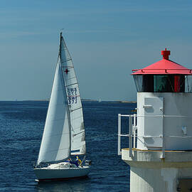 Sailboat And Lighthouse On The Baltic Sea, In Skagerrak, Västergötland, Sweden by Torsten Rathjen