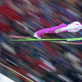 Ski Jumper In Midair by John P Kelly