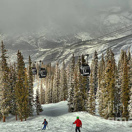 Skiers Under The Aspen Gondola by Adam Jewell
