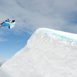 Snowboarder In Terrain Park by John P Kelly