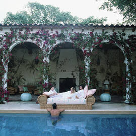 Sofa By The Pool by Slim Aarons