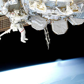 Space Shuttle Discovery Continues by Nasa