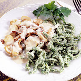 Spinach Noodles With Mushroom Sauce And Coriander On Plate by Jalag / Uwe Bender