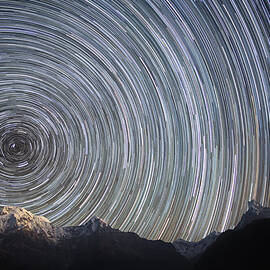 Spinning Stars Above Himalayas by Anton Jankovoy