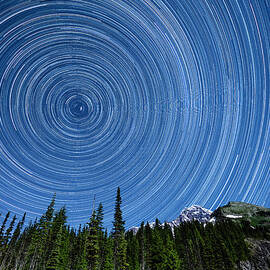 Star Trails Above Mount Rainier by Ed Leckert