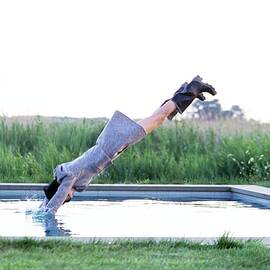 Stella Tennant Diving Into A Pool by Arthur Elgort