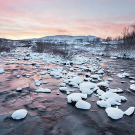 Sunset Over Freezing Stream In Finland by Esen Tunar Photography