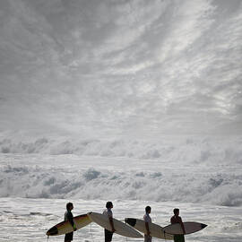 Surfers With Surfboard On Beach by Ed Freeman