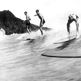 Surfing In Hawaii by General Photographic Agency