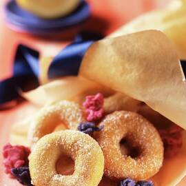 Sweet Ring Pastries With Candied Flowers by Blueberrystudio