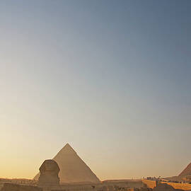 The Giza Pyramids And Sphinx At Sunset by Matt Champlin