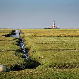 The Westerhever Lighthouse On A Terp Eiderstedt Saltpans by Jalag / Isabela Pacini