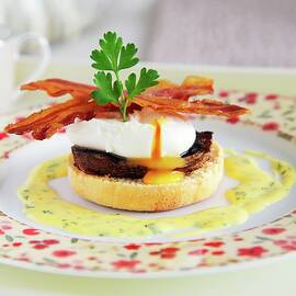 Toast Topped With A Poached Egg And Bacon by Heinze, Winfried