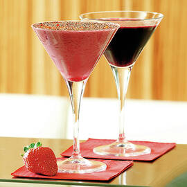 Two Cocktails In Martini Glasses With Strawberry by Jalag / Stefan Abtmeyer