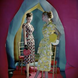 Two Models Beneath Arches Cut Of Colored Paper by Cecil Beaton